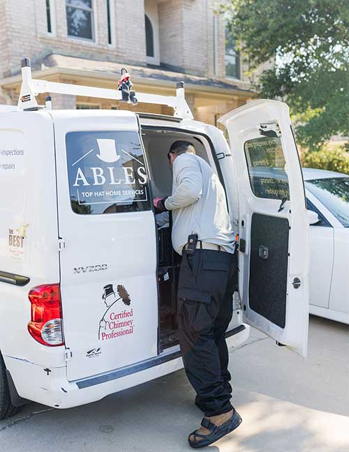 Technician with Ables Top Hat Van